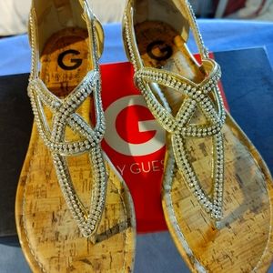 Guess, Flat Sandals size 8 Matelic Gold with Rhinestone uppers.